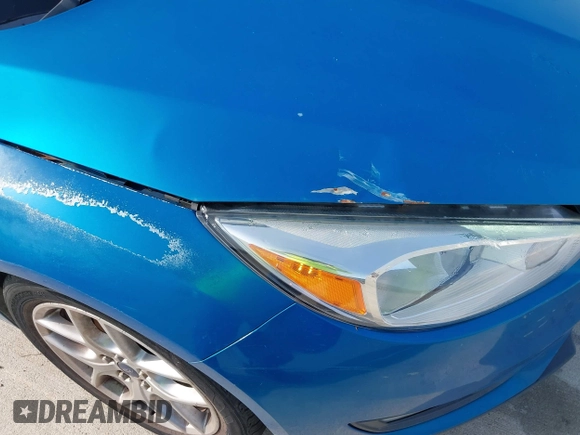 2015 Ford Focus SE with VIN 1FADP3F21FL326927, listed as a IAAI auction lot 42628577 with 112,199 mi miles and . Bid and sale history available at DreamBid. Image 6.