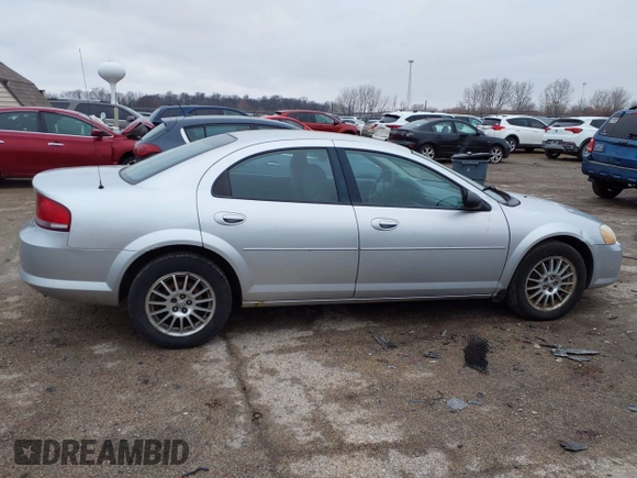 2004 Chrysler Sebring Touring z VIN 1C3EL56R74N392214, wystawiony jako IAAI lot #41510245 z przebiegiem 159 751 mil mil oraz . Historia ofert i sprzedaży dostępna na DreamBid. Obrazek 13.