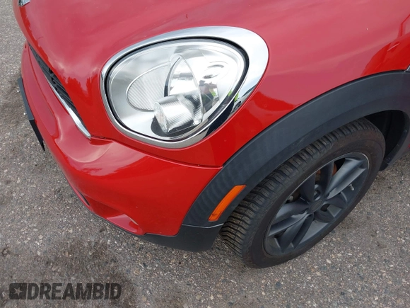2013 MINI Countryman S with VIN WMWZC3C57DWP21892, listed as a IAAI auction lot 42402600 with 59,700 mi miles and . Bid and sale history available at DreamBid. Image 6.