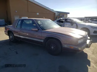 1988 Cadillac Eldorado with VIN 1G6EL1153JU632470, listed as a Copart auction lot 78507684 with 176,894 mi miles and Salvage Title. Bid and sale history available at DreamBid. Image 4.