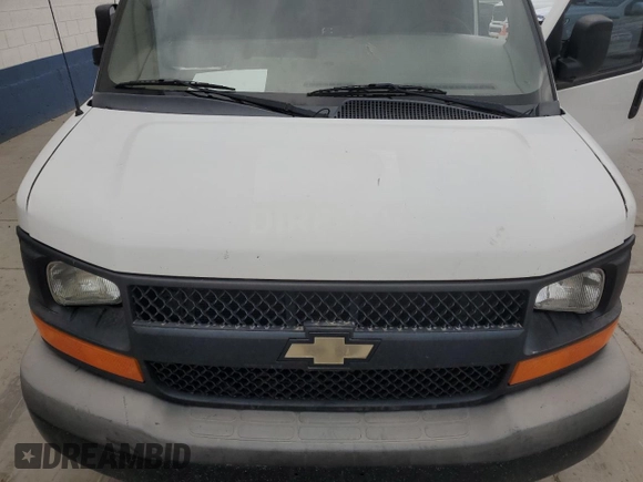 2012 Chevrolet Express Cargo z VIN 1GCWGFCAXC1177408, wystawiony jako Copart lot #64615955 z przebiegiem Nie podano mil oraz Czysty tytuł • Clean title. Historia ofert i sprzedaży dostępna na DreamBid. Obrazek 11.