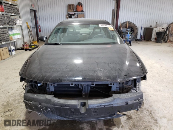 1999 Buick Regal GS with VIN 2G4WF5219X1424704, listed as a Copart auction lot 42899215 with 137,744 mi miles and Salvage Title. Bid and sale history available at carsss.com. Image 5.