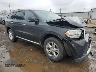 2013 Dodge Durango Crew with VIN 1C4RDHDG5DC663991, listed as a Copart auction lot 48491985 with 143,310 mi miles and Salvage Title. Bid and sale history available at carsss.com. Image 4.