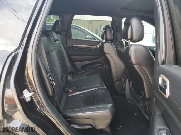 2015 Jeep Grand Cherokee Laredo with VIN 1C4RJFAG5FC724874, listed as a Copart auction lot 52462214 with 99,650 mi miles and Salvage Title. Bid and sale history available at carsss.com. Image 10.