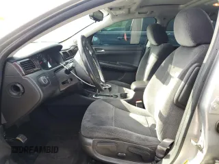 2014 Chevrolet Impala LT with VIN 2G1WB5E3XE1184419, listed as a Copart auction lot 51473045 with 98,299 mi miles and Salvage Title. Bid and sale history available at DreamBid. Image 7.
