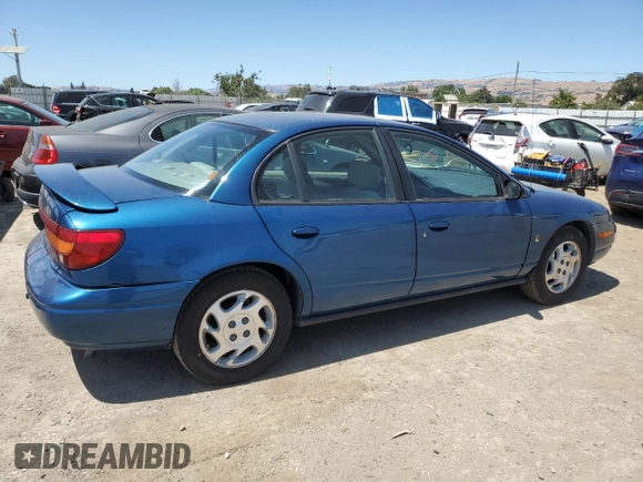 2000 Saturn SL with VIN 1G8ZK5271YZ184701, listed as a Copart auction lot 61598135 with 123,309 mi miles and Salvage title. Bid and sale history available at DreamBid. Image 3.