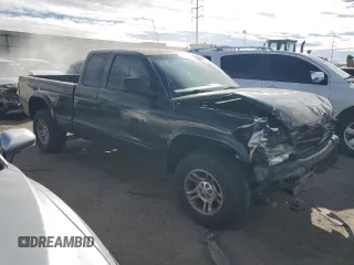 2004 Dodge Dakota SLT with VIN 1D7HG42N44S749267, listed as a Copart auction lot 89313825 with 215,047 mi miles and Salvage Title. Bid and sale history available at carsss.com. Image 4.