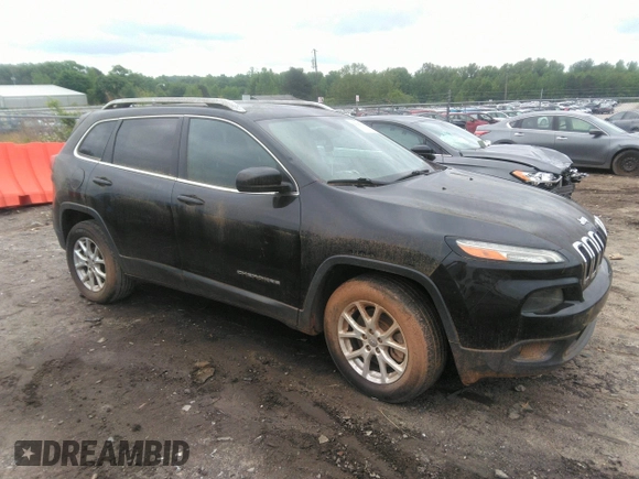 2014 Jeep Cherokee Latitude with VIN 1C4PJLCB1EW231178, listed as a IAAI auction lot 42128894 with 121,412 mi miles. Bid and sale history available at carsss.com. Image 1.