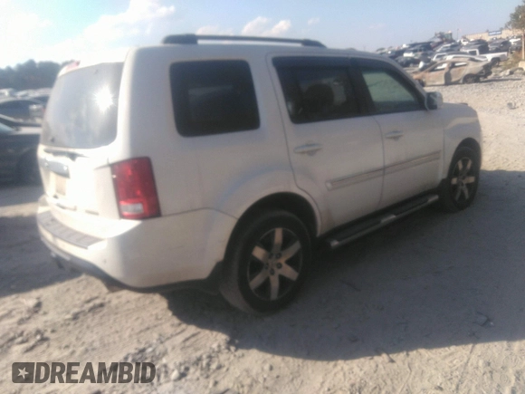 2012 Honda Pilot Touring with VIN 5FNYF3H92CB027292, listed as a IAAI auction lot 40617936 with 140,455 mi miles and . Bid and sale history available at carsss.com. Image 4.