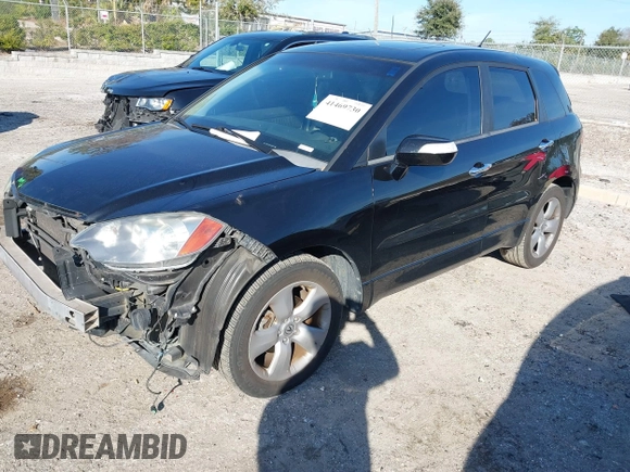 2009 Acura RDX with VIN 5J8TB18249A003141, listed as a IAAI auction lot 41469730 with 180,358 mi miles and . Bid and sale history available at DreamBid. Image 2.