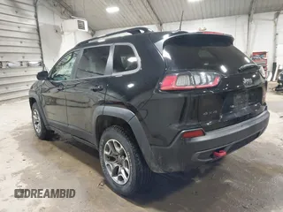 2022 Jeep Cherokee Trailhawk with VIN 1C4PJMBX8ND517236, listed as a IAAI auction lot 41530369 with 34,164 mi miles and . Bid and sale history available at DreamBid. Image 3.