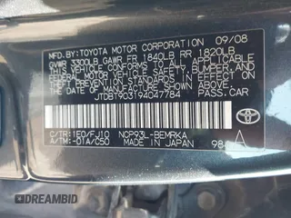 2009 Toyota Yaris with VIN JTDBT903194047784, listed as a IAAI auction lot 42049872 with 115,735 mi miles. Bid and sale history available at carsss.com. Image 9.