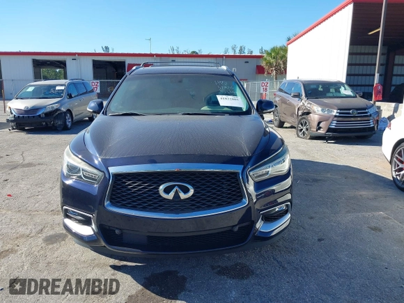 2016 Infiniti QX60 with VIN 5N1AL0MN4GC532048, listed as a IAAI auction lot 41832885 with 125,306 mi miles and . Bid and sale history available at DreamBid. Image 12.