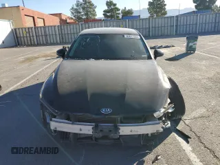 2021 Kia K5 LXS with VIN 5XXG14J20MG022815, listed as a Copart auction lot 83011334 with 77,822 mi miles and Salvage Title. Bid and sale history available at carsss.com. Image 5.