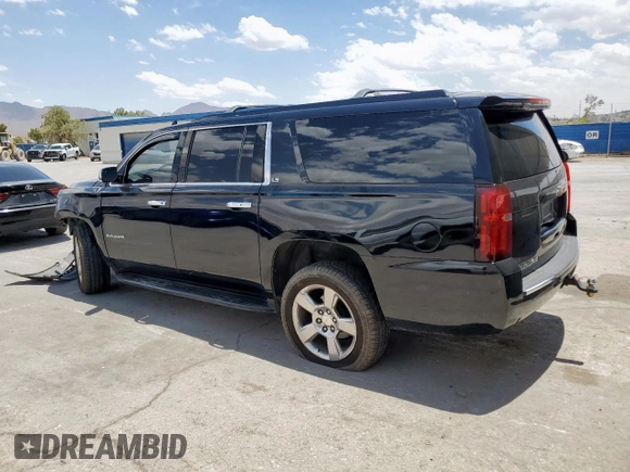 2015 Chevrolet Suburban LS z VIN 1GNSCHKC2FR707277, wystawiony jako Copart lot #59541635 z przebiegiem 198 876 mil mil oraz Szkoda całkowita • Salvage title. Historia ofert i sprzedaży dostępna na DreamBid. Obrazek 2.
