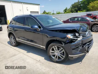 2015 Volkswagen Touareg Lux z VIN WVGEP9BP2FD006802, wystawiony jako Copart lot #52291965 z przebiegiem 122 787 mil mil oraz Szkoda całkowita • Salvage title. Historia ofert i sprzedaży dostępna na DreamBid. Obrazek 4.