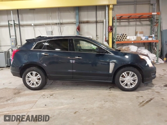 2016 Cadillac SRX Luxury Collection z VIN 3GYFNEE38GS565721, wystawiony jako IAAI lot #41963005 z przebiegiem 87 005 mil mil oraz . Historia ofert i sprzedaży dostępna na DreamBid. Obrazek 13.