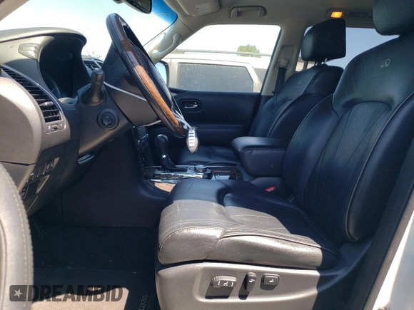 2014 Infiniti QX80 with VIN JN8AZ2NC9E9350906, listed as a Copart auction lot 65817505 with 123,790 mi miles and Clean title. Bid and sale history available at DreamBid. Image 7.