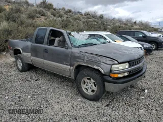 2000 Chevrolet Silverado 1500 LS with VIN 2GCEK19T8Y1171579, listed as a Copart auction lot 52135075 with 218,993 mi miles and Salvage Title. Bid and sale history available at carsss.com. Image 4.