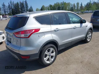 2014 Ford Escape SE with VIN 1FMCU9GX1EUB48145, listed as a IAAI auction lot 42111206 with 113,006 mi miles and . Bid and sale history available at carsss.com. Image 4.