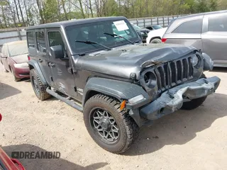 2019 Jeep Wrangler Unlimited Sport S z VIN 1C4HJXDG2KW516571, wystawiony jako IAAI lot #42043223 z przebiegiem 58 131 mil mil oraz . Historia ofert i sprzedaży dostępna na DreamBid. Obrazek 1.