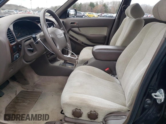 1994 Toyota Camry LE z VIN 4T1GK12E9RU063977, wystawiony jako Copart lot #47723075 z przebiegiem 74 854 mil mil oraz Czysty tytuł • Clean title. Historia ofert i sprzedaży dostępna na DreamBid. Obrazek 7.