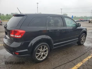 2014 Dodge Journey R/T with VIN 3C4PDDEG2ET309284, listed as a Copart auction lot 59350205 with 132,903 mi miles and Salvage title. Bid and sale history available at DreamBid. Image 3.