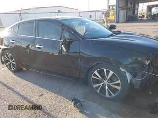 2018 Nissan Maxima SL with VIN 1N4AA6AP3JC401046, listed as a IAAI auction lot 42144400 with 86,330 mi miles and . Bid and sale history available at DreamBid. Image 6.