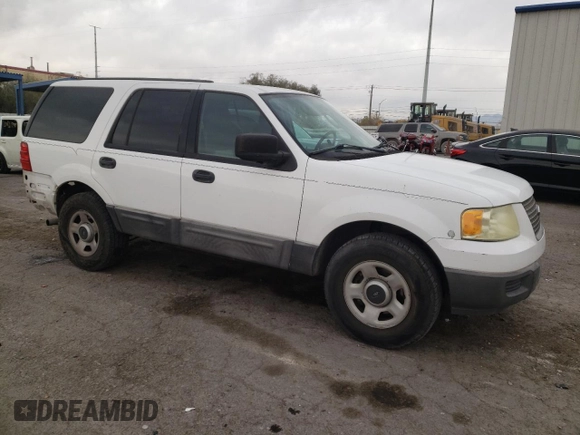 2004 Ford Expedition XLS with VIN 1FMRU13W74LB40774, listed as a Copart auction lot 84467024 with 217,945 mi miles and Salvage Title. Bid and sale history available at carsss.com. Image 4.