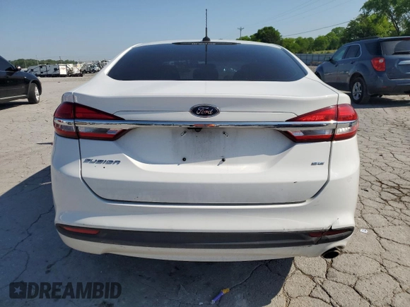 2017 Ford Fusion SE z VIN 3FA6P0H71HR113111, wystawiony jako Copart lot #54502865 z przebiegiem 114 362 mil mil oraz Szkoda całkowita • Salvage title. Historia ofert i sprzedaży dostępna na DreamBid. Obrazek 6.