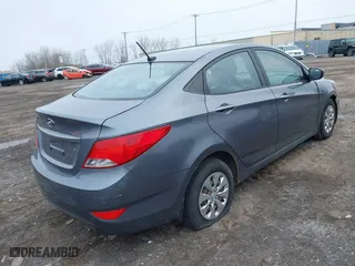 2015 Hyundai Accent GLS with VIN KMHCT4AE0FU929088, listed as a IAAI auction lot 41993359 with 149,958 mi miles. Bid and sale history available at carsss.com. Image 4.