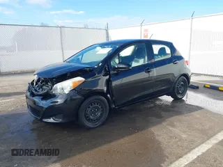 2014 Toyota Yaris L with VIN JTDKTUD36ED586456, listed as a IAAI auction lot 41888730 with 92,742 mi miles. Bid and sale history available at carsss.com. Image 17.