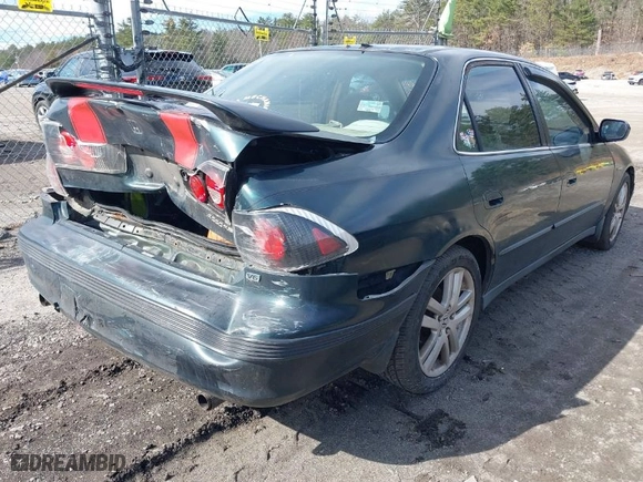 1999 Honda Accord Sdn LX with VIN 1HGCG1642XA054298, listed as a IAAI auction lot 41809605 with 194,286 mi miles. Bid and sale history available at carsss.com. Image 4.