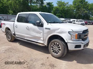2020 Ford F-150 XL with VIN 1FTEW1E59LKE78957, listed as a IAAI auction lot 42021245 with 92,322 mi miles and . Bid and sale history available at DreamBid. Image 1.