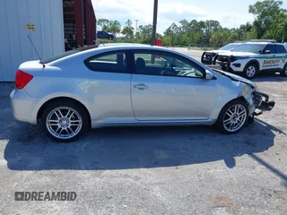 2005 Scion tC z VIN JTKDE177750018300, wystawiony jako IAAI lot #42287128 z przebiegiem 188 278 mil mil oraz . Historia ofert i sprzedaży dostępna na DreamBid. Obrazek 14.