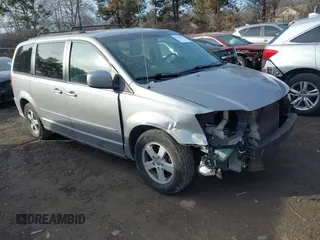 2013 Dodge Grand Caravan SXT with VIN 2C4RDGCG8DR551723, listed as a IAAI auction lot 41510574 with 183,432 mi miles and . Bid and sale history available at DreamBid. Image 1.