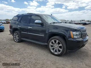 2011 Chevrolet Tahoe LTZ with VIN 1GNSCCE07BR131782, listed as a Copart auction lot 52981165 with 263,958 mi miles and Salvage Title. Bid and sale history available at carsss.com. Image 4.