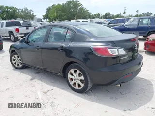 2011 Mazda Mazda3 i Touring with VIN JM1BL1VFXB1472772, listed as a IAAI auction lot 42180030 with 128,438 mi miles. Bid and sale history available at carsss.com. Image 3.