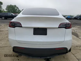 2024 Tesla Model Y Long Range with VIN 7SAYGDEE2RA329081, listed as a Copart auction lot 57254265 with 2,325 mi miles and Salvage title. Bid and sale history available at DreamBid. Image 6.