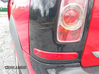 2013 MINI Clubman z VIN WMWZF3C50DT490262, wystawiony jako IAAI lot #41674033 z przebiegiem 194 622 mil mil oraz . Historia ofert i sprzedaży dostępna na DreamBid. Obrazek 13.