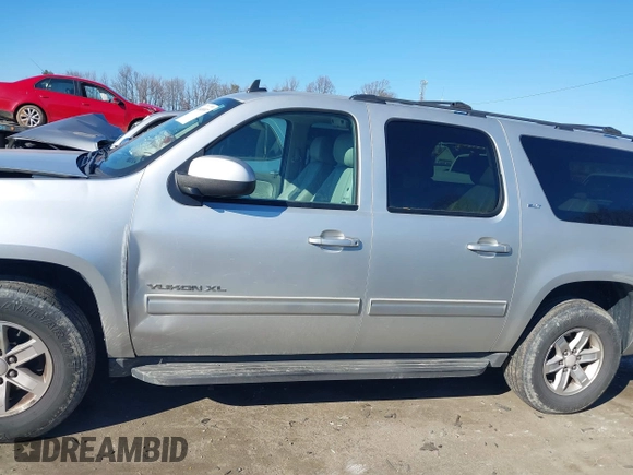 2011 GMC Yukon XL SLT z VIN 1GKS1KE05BR386637, wystawiony jako IAAI lot #41648997 z przebiegiem 162 262 mil mil oraz . Historia ofert i sprzedaży dostępna na DreamBid. Obrazek 14.