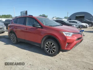 2017 Toyota RAV4 LE with VIN 2T3BFREV9HW543578, listed as a Copart auction lot 57887255 with 97,688 mi miles and Salvage title. Bid and sale history available at DreamBid. Image 4.