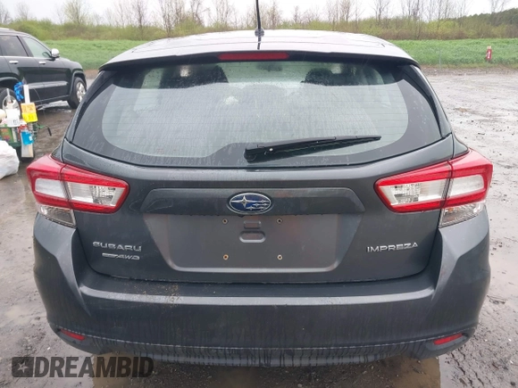 2018 Subaru Impreza with VIN 4S3GTAA67J3728185, listed as a IAAI auction lot 42140197 with 77,090 mi miles and . Bid and sale history available at DreamBid. Image 16.