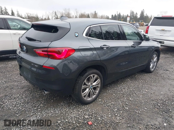 2018 BMW X2 xDrive28i with VIN WBXYJ5C37JEF74740, listed as a IAAI auction lot 41818174 with 74,155 mi miles. Bid and sale history available at carsss.com. Image 4.