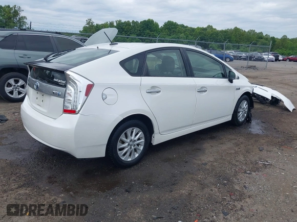 2014 Toyota Prius with VIN JTDKN3DP6E3055058, listed as a IAAI auction lot 42233555 with 133,718 mi miles and . Bid and sale history available at DreamBid. Image 4.