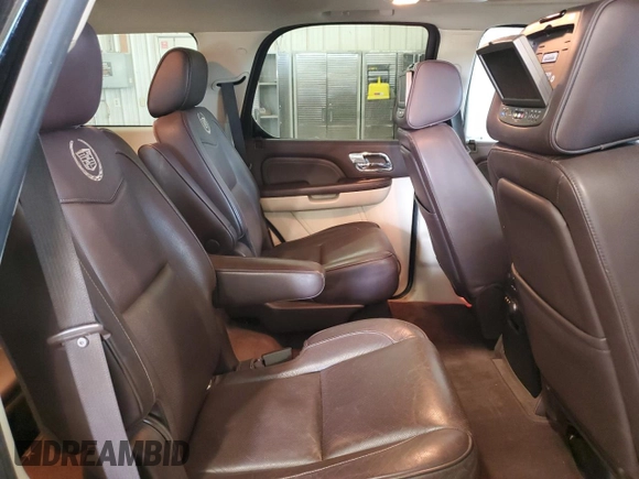 2011 Cadillac Escalade Platinum Edition z VIN 1GYS4DEF6BR193040, wystawiony jako Copart lot #56910155 z przebiegiem 132 754 mil mil oraz Szkoda całkowita • Salvage title. Historia ofert i sprzedaży dostępna na DreamBid. Obrazek 11.