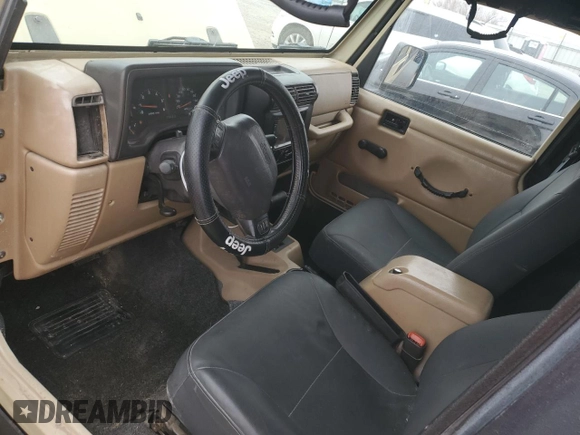 2001 Jeep Wrangler Sport с VIN 1J4FA49S71P312113, выставлен на аукционе Copart как лот 51168125 с пробегом 120 683 миль миль и Списание • Salvage title. История ставок и продаж доступна на DreamBid. Изображение 8.