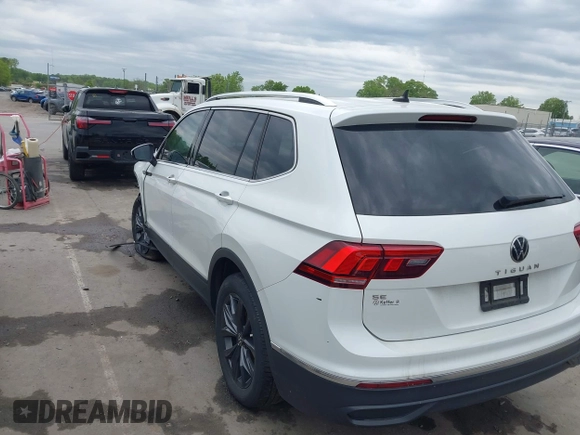 2023 Volkswagen Tiguan SE with VIN 3VVMB7AX0PM036876, listed as a IAAI auction lot 42023415 with 42,003 mi miles and . Bid and sale history available at DreamBid. Image 3.