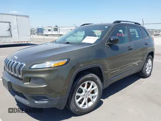 2015 Jeep Cherokee Sport with VIN 1C4PJMAB9FW595102, listed as a IAAI auction lot 42257918 with 95,059 mi miles and . Bid and sale history available at DreamBid. Image 2.