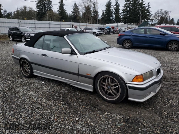 1999 BMW 3 Series 328ic with VIN WBABK7331XET68084, listed as a Copart auction lot 86205884 with 0 mi miles and Salvage Title. Bid and sale history available at carsss.com. Image 4.